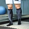 Move with confidence and comfort in the Socks World Black Performance Compression Socks. Crafted for active lifestyles, these knee-high athletic socks feature a breathable knit design and supportive stretch fit that helps keep you comfortable during workouts, training sessions, running, and daily activities. The sleek black and gray style delivers a modern sporty look that pairs perfectly with any athletic outfit. Moisture-wicking breathable fabric Flexible and supportive compression fit Great for sports, fitness & everyday wear Lightweight design for lasting comfort Modern black athletic style for active movement