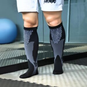 Move with confidence and comfort in the Socks World Black Performance Compression Socks. Crafted for active lifestyles, these knee-high athletic socks feature a breathable knit design and supportive stretch fit that helps keep you comfortable during workouts, training sessions, running, and daily activities. The sleek black and gray style delivers a modern sporty look that pairs perfectly with any athletic outfit. Moisture-wicking breathable fabric Flexible and supportive compression fit Great for sports, fitness & everyday wear Lightweight design for lasting comfort Modern black athletic style for active movement